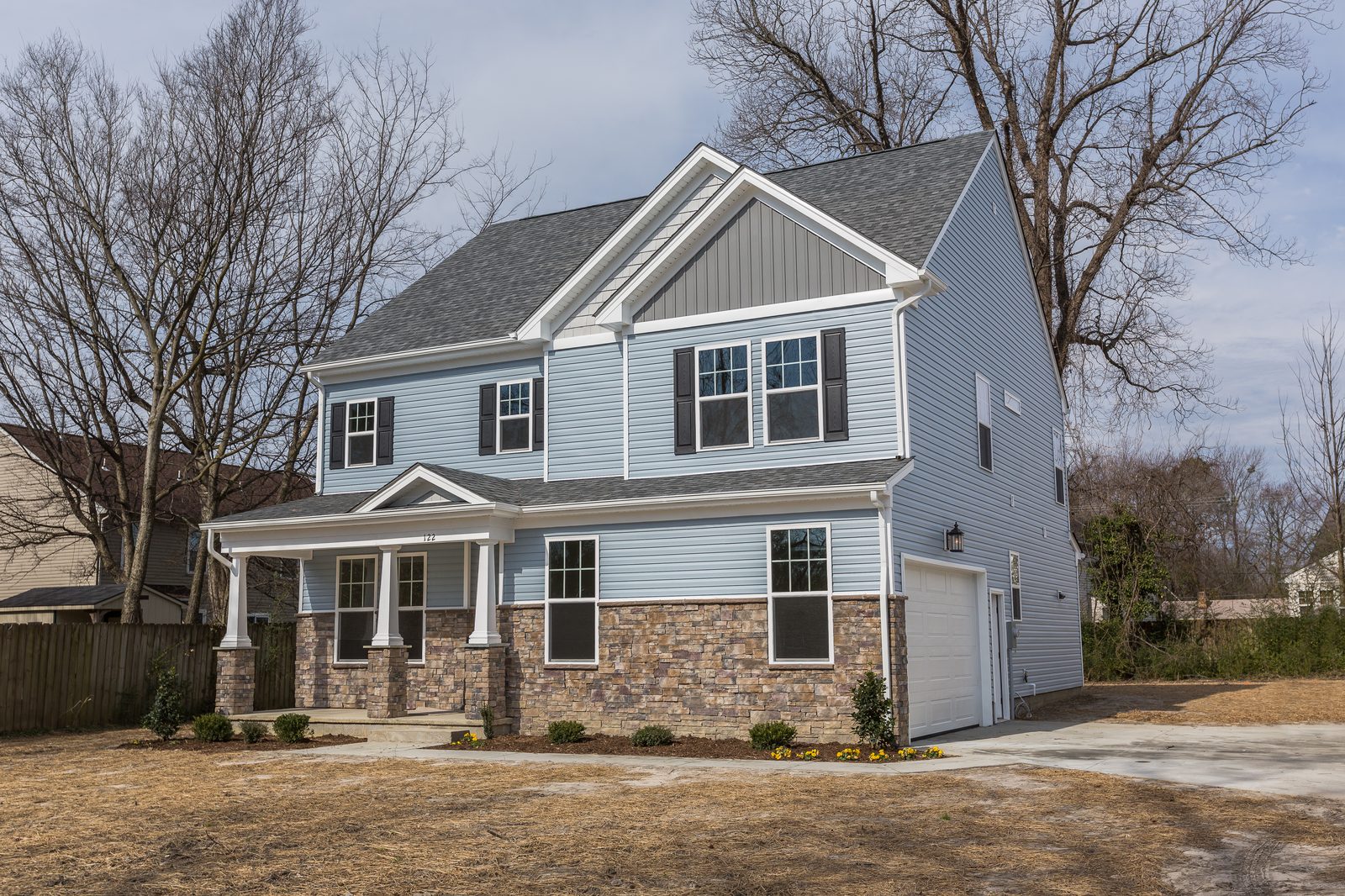 Two-story Kenston home with a front porch